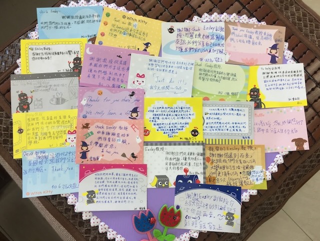 A heart-shaped spread of handmade thank-you cards from students at the rural Hsinchu middle schools